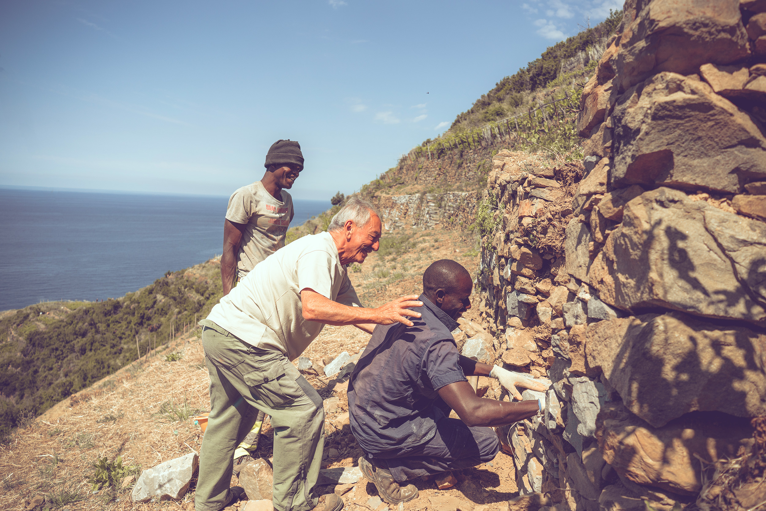 Title: Building a dry stone wall; Year: 2018; Place: Parco Nazionale Cinque Terre (Italy); Author & Copyright: Michael Pasini, Archivio Foto Parco Nazionale Cinque Terre Image