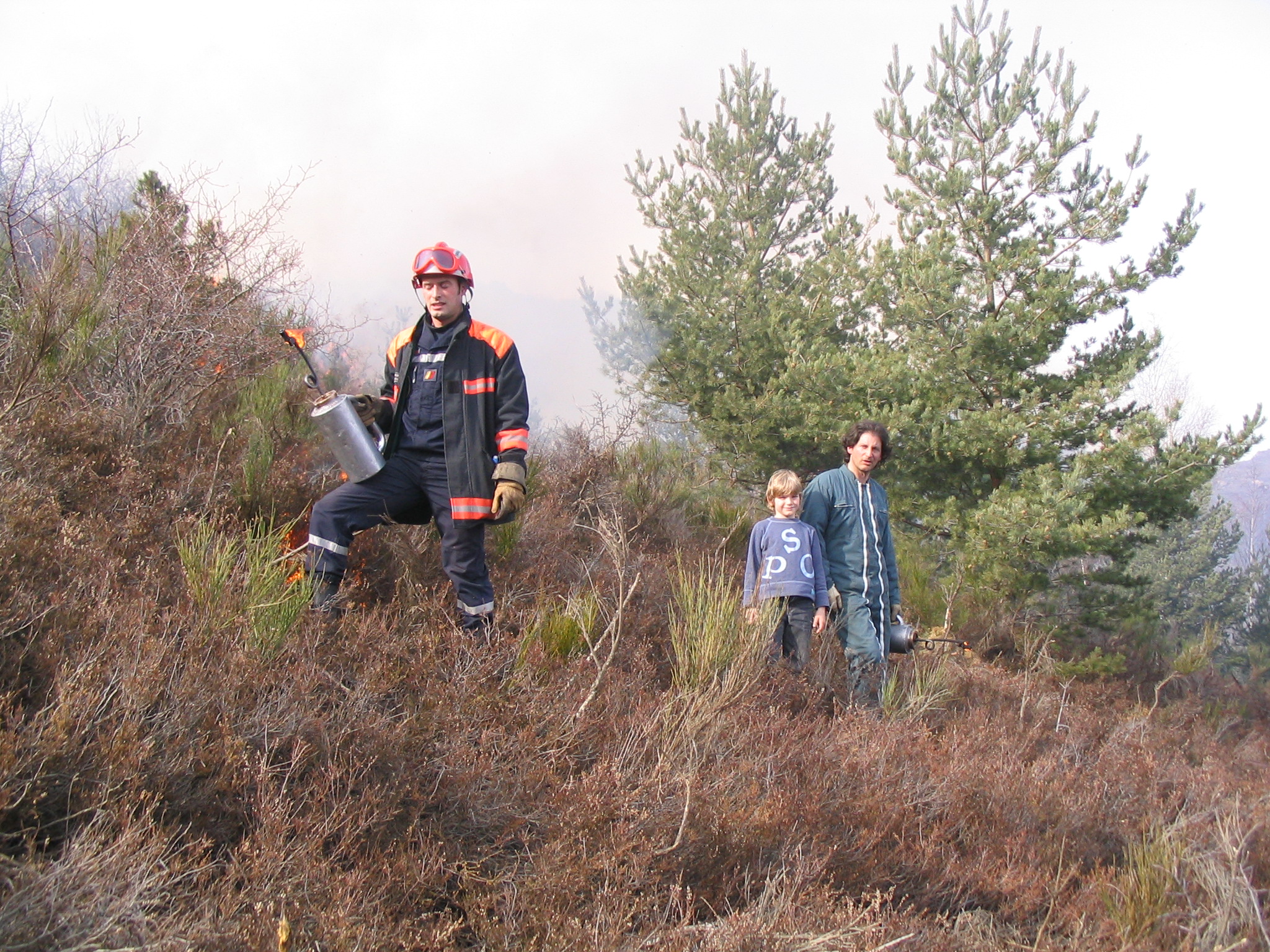 Title: Burning of broom-fern moorland by a farmer training with his son; Year: 2007; Place: Baillestavy, France; Author & Copyright: Bernard Lambert Image